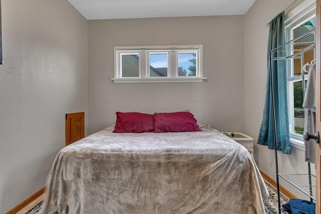 212 31st Ave N, Saint Cloud, MN 56303 - bedroom featuring wood finished floors