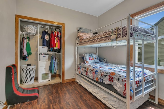 212 31st Ave N, Saint Cloud, MN 56303 - bedroom with wood finished floors and a closet