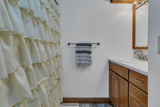 212 31st Ave N, Saint Cloud, MN 56303 - full bathroom with vanity and a shower with shower curtain