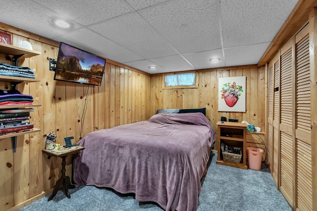 212 31st Ave N, Saint Cloud, MN 56303 - bedroom featuring carpet floors, wooden walls, and a paneled ceiling