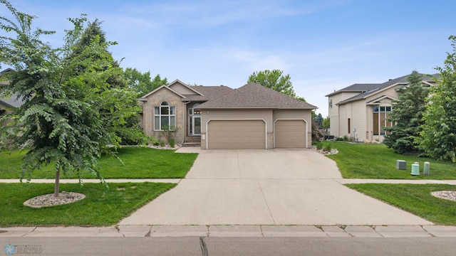 3020 26th Ave S, Fargo, ND 58103 - single story home with an attached garage, a front lawn, concrete driveway, and brick siding