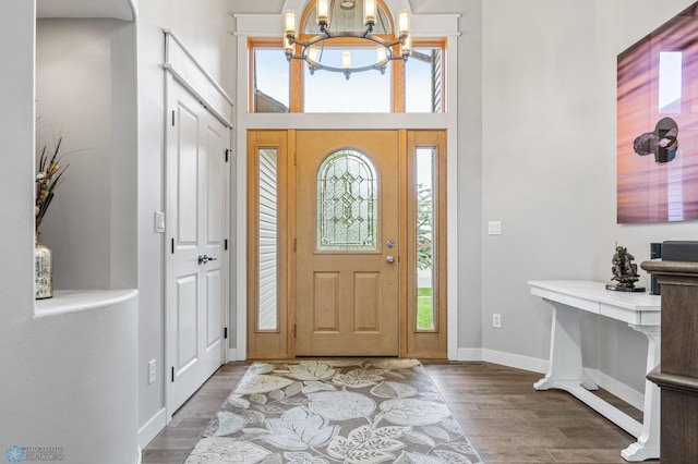 3020 26th Ave S, Fargo, ND 58103 - entrance foyer featuring a chandelier, wood finished floors, healthy amount of natural light, and a high ceiling