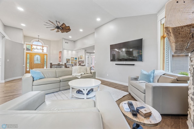 3020 26th Ave S, Fargo, ND 58103 - living room featuring wood finished floors, a chandelier, recessed lighting, and high vaulted ceiling