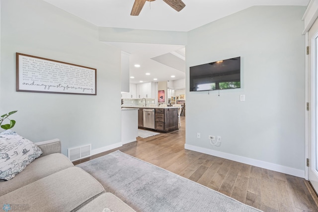 3020 26th Ave S, Fargo, ND 58103 - living area featuring ceiling fan, light wood-style floors, lofted ceiling, and recessed lighting
