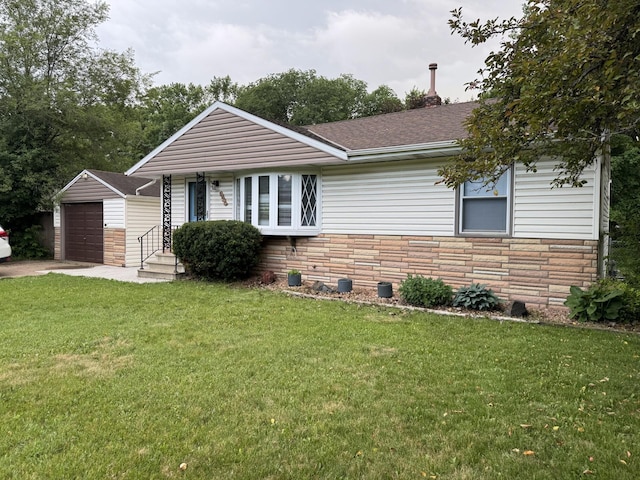 5923 Hodgson Rd, Shoreview, MN 55126 - view of front of home featuring stone siding, an outbuilding, a detached garage, a front lawn, and roof with shingles