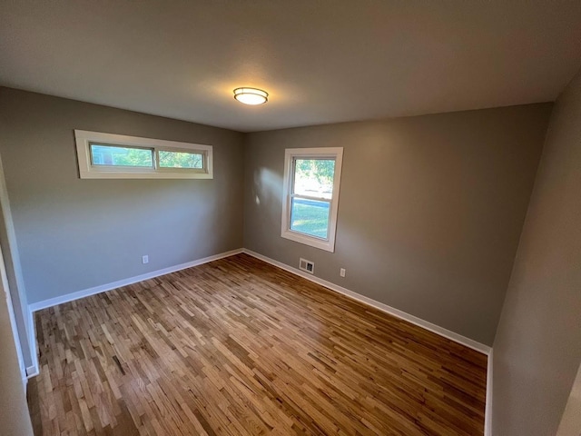 5923 Hodgson Rd, Shoreview, MN 55126 - empty room featuring wood finished floors