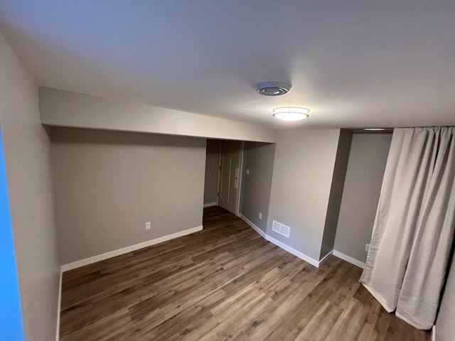 5923 Hodgson Rd, Shoreview, MN 55126 - finished below grade area featuring wood finished floors and baseboards