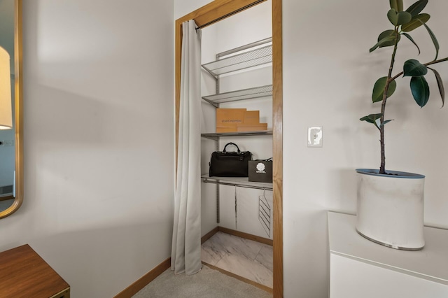 3000 Raleigh Ave Unit 307, Saint Louis Park, MN 55416 - hallway with baseboards and marble look tile flooring