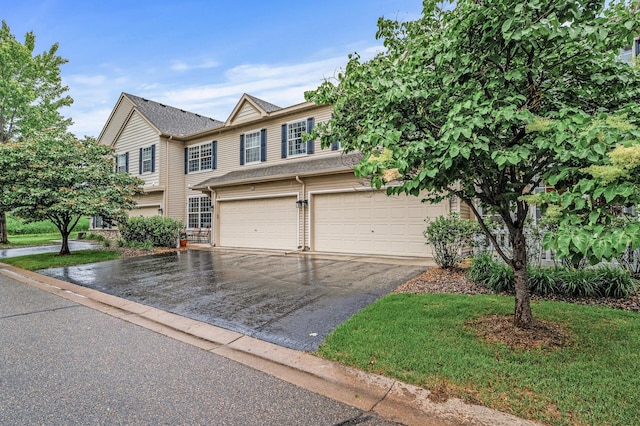 11122 Aberdeen St NE Unit C, Blaine, MN 55449 - townhome / multi-family property with driveway and a garage