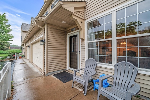 11122 Aberdeen St NE Unit C, Blaine, MN 55449 - view of patio with driveway and a garage