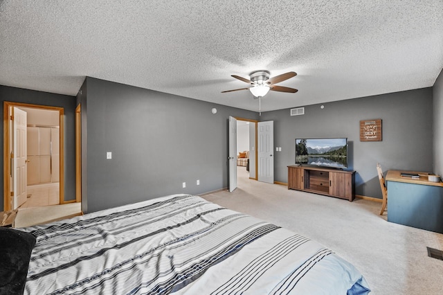11122 Aberdeen St NE Unit C, Blaine, MN 55449 - bedroom featuring light carpet, a textured ceiling, and ceiling fan