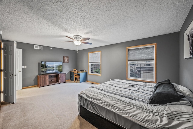 11122 Aberdeen St NE Unit C, Blaine, MN 55449 - carpeted bedroom featuring a textured ceiling and a ceiling fan