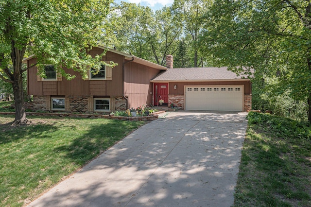 13587 70th Ave N, Maple Grove, MN 55311 - split level home featuring brick siding, a garage, driveway, and a front yard