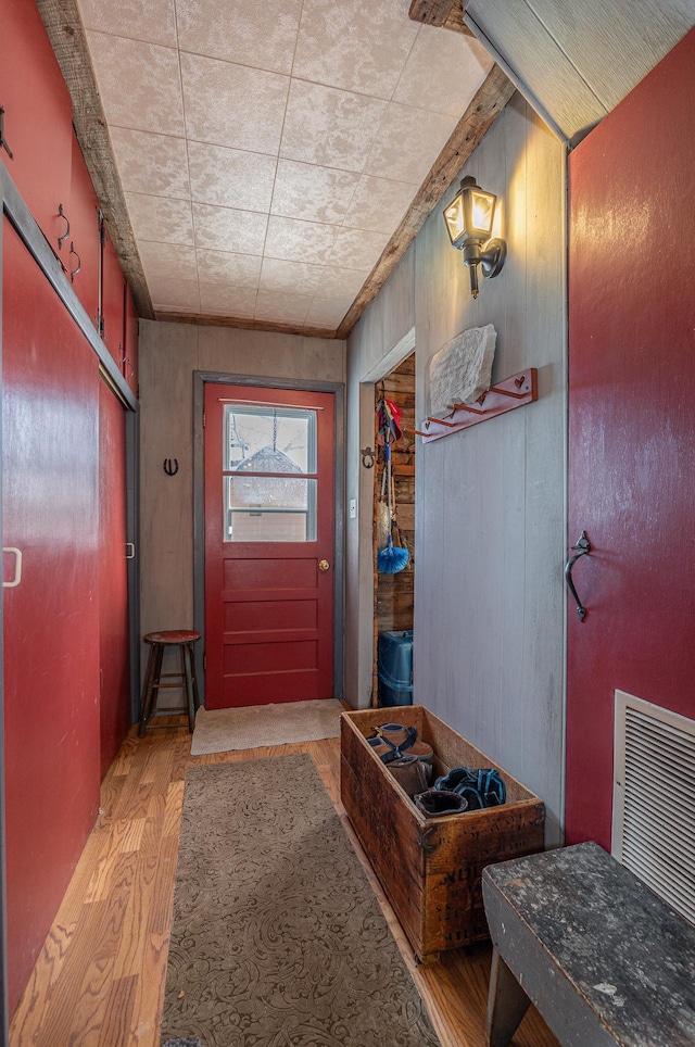 2170 County 5 NW, Hackensack, MN 56452 - entryway featuring wood finished floors and wooden walls