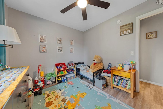 1030 Barron Rd, Faribault, MN 55021 - rec room with a ceiling fan and wood finished floors