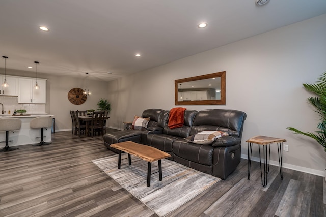422 Ford St E, Northfield, MN 55057 - living area featuring recessed lighting, dark wood finished floors, and a chandelier