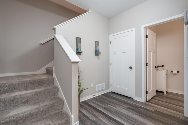 422 Ford St E, Northfield, MN 55057 - stairway featuring wood finished floors and baseboards
