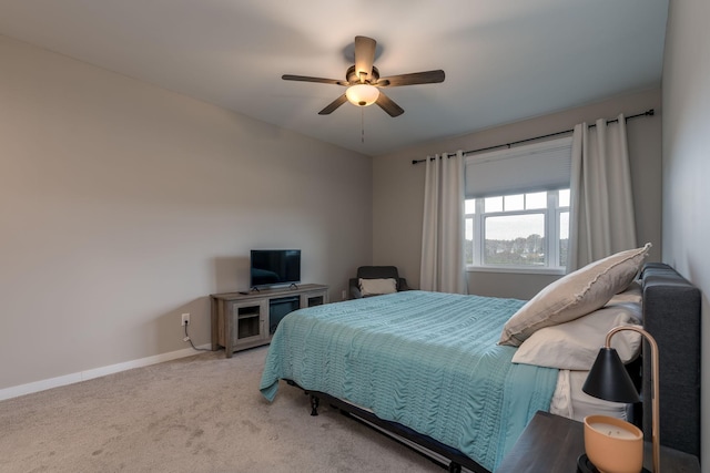 422 Ford St E, Northfield, MN 55057 - carpeted bedroom with baseboards and a ceiling fan