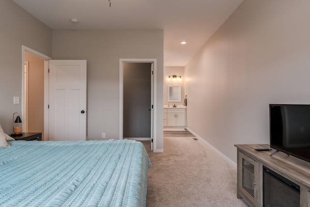 422 Ford St E, Northfield, MN 55057 - bedroom with light carpet, ensuite bath, and recessed lighting