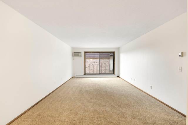 205 Barry Ave S Unit 208, Wayzata, MN 55391 - empty room with a wall mounted AC, carpet flooring, and a baseboard heating unit
