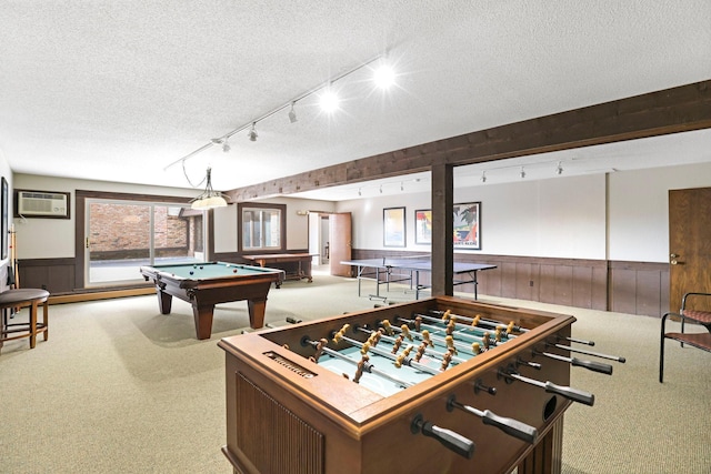 205 Barry Ave S Unit 208, Wayzata, MN 55391 - playroom featuring carpet, rail lighting, a textured ceiling, wainscoting, and a wall mounted air conditioner