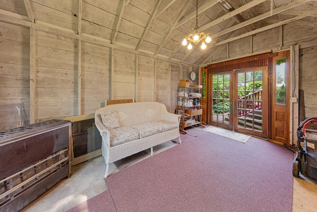 825 5th Ave SW, Faribault, MN 55021 - living area featuring vaulted ceiling, wood walls, a chandelier, and wood ceiling