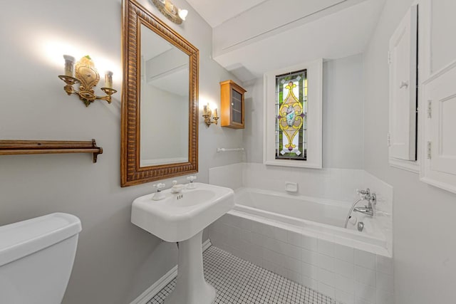 825 5th Ave SW, Faribault, MN 55021 - bathroom featuring a garden tub and tile patterned floors