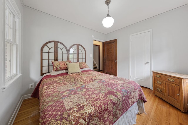 825 5th Ave SW, Faribault, MN 55021 - bedroom featuring light wood finished floors