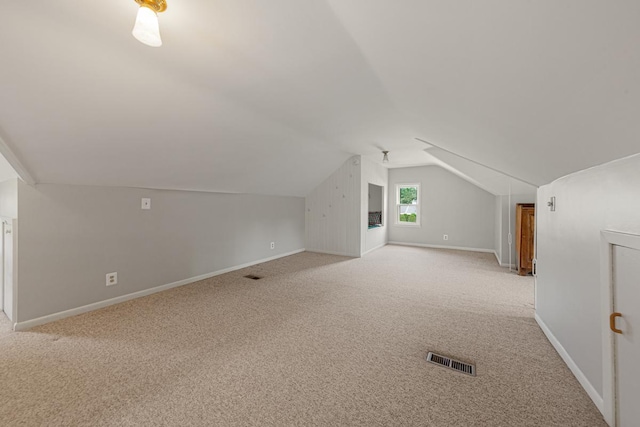 825 5th Ave SW, Faribault, MN 55021 - bonus room featuring light carpet and vaulted ceiling