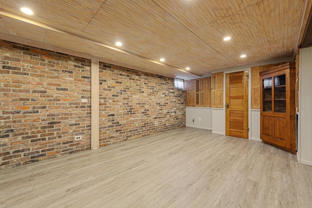 825 5th Ave SW, Faribault, MN 55021 - unfurnished room with wooden ceiling, light wood-style floors, brick wall, and recessed lighting