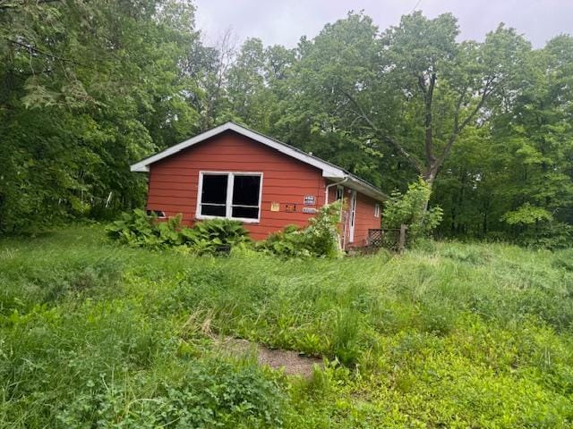 47115 Partridge Pass, Kathio Twp, MN 56450 - view of side of home with a forest view