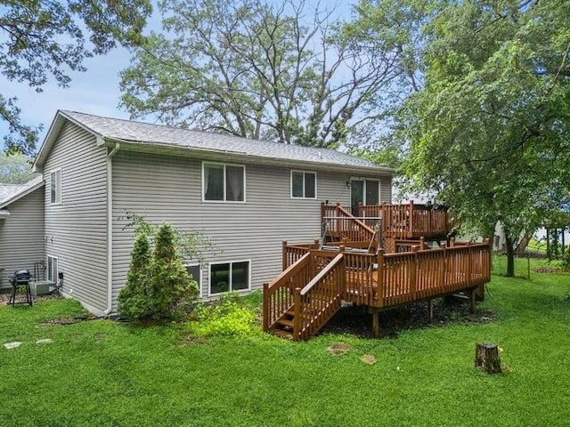 26343 10th St W, Zimmerman, MN 55398 - rear view of property with a deck, a lawn, stairway, and roof with shingles