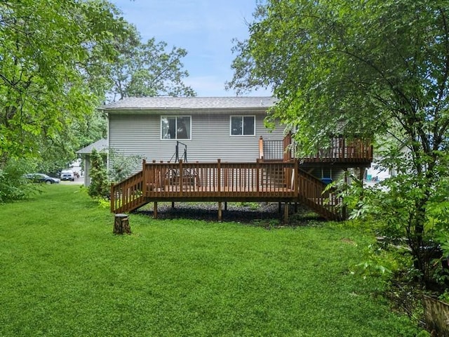26343 10th St W, Zimmerman, MN 55398 - back of property with a wooden deck, a yard, and stairs