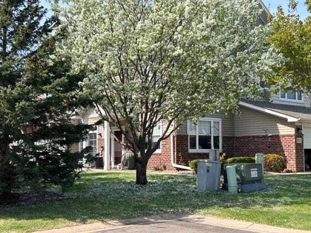 20354 Kensfield Trl Unit 1403, Lakeville, MN 55044 - view of front of property featuring brick siding and a front yard