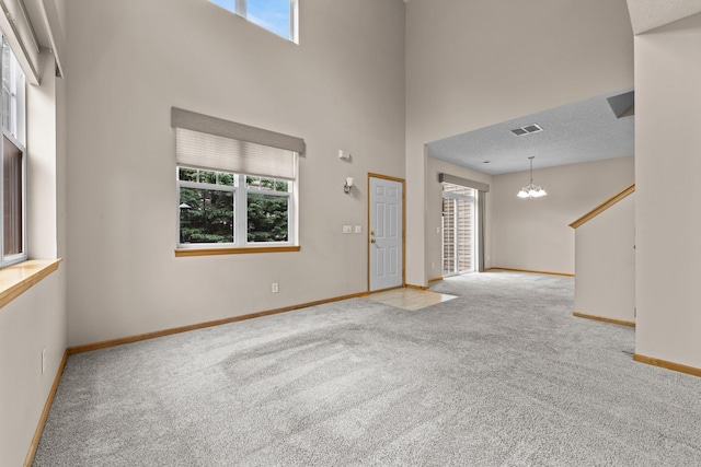 20354 Kensfield Trl Unit 1403, Lakeville, MN 55044 - carpeted entrance foyer featuring healthy amount of natural light, a chandelier, and a high ceiling