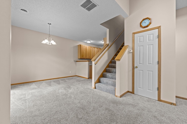 20354 Kensfield Trl Unit 1403, Lakeville, MN 55044 - stairs featuring carpet flooring, a chandelier, and a textured ceiling