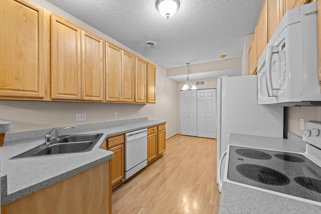 20354 Kensfield Trl Unit 1403, Lakeville, MN 55044 - kitchen with white appliances, light wood-style floors, a textured ceiling, decorative light fixtures, and light brown cabinets