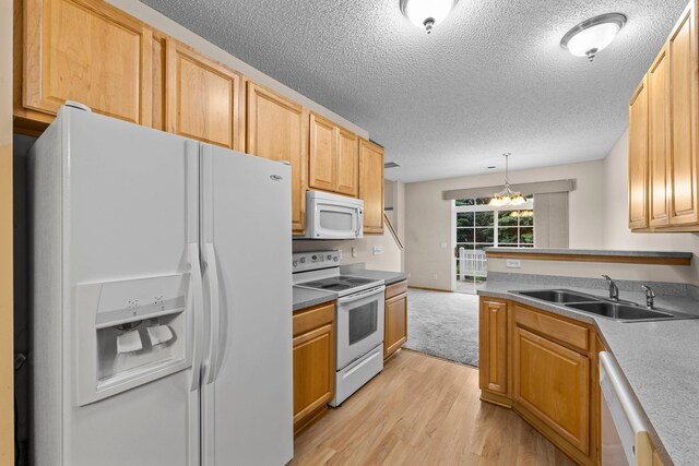 20354 Kensfield Trl Unit 1403, Lakeville, MN 55044 - kitchen featuring white appliances, light wood-style flooring, a chandelier, decorative light fixtures, and a textured ceiling