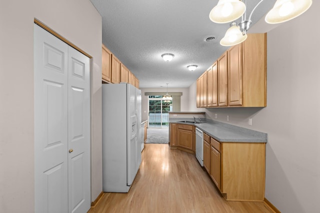 20354 Kensfield Trl Unit 1403, Lakeville, MN 55044 - kitchen with white appliances, light wood-style flooring, a textured ceiling, pendant lighting, and light countertops