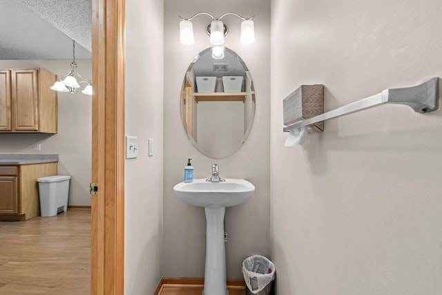20354 Kensfield Trl Unit 1403, Lakeville, MN 55044 - bathroom featuring wood finished floors and baseboards