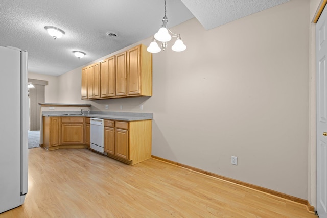 20354 Kensfield Trl Unit 1403, Lakeville, MN 55044 - kitchen with dishwasher, a textured ceiling, freestanding refrigerator, light wood-type flooring, and a chandelier