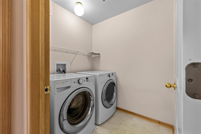 20354 Kensfield Trl Unit 1403, Lakeville, MN 55044 - laundry area featuring independent washer and dryer and a textured ceiling