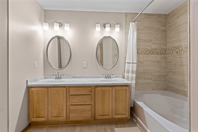 20354 Kensfield Trl Unit 1403, Lakeville, MN 55044 - full bath featuring double vanity, shower / bath combination with curtain, and a textured ceiling