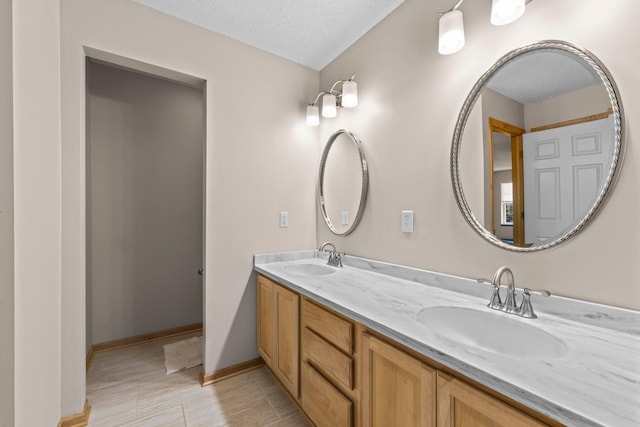 20354 Kensfield Trl Unit 1403, Lakeville, MN 55044 - full bath with double vanity and a textured ceiling