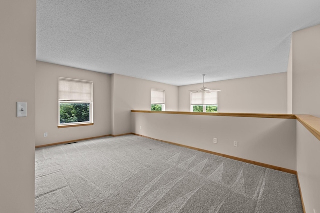 20354 Kensfield Trl Unit 1403, Lakeville, MN 55044 - unfurnished room featuring a ceiling fan, carpet, and a textured ceiling