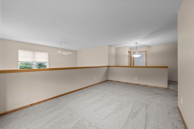 20354 Kensfield Trl Unit 1403, Lakeville, MN 55044 - spare room with carpet floors, a textured ceiling, and a ceiling fan