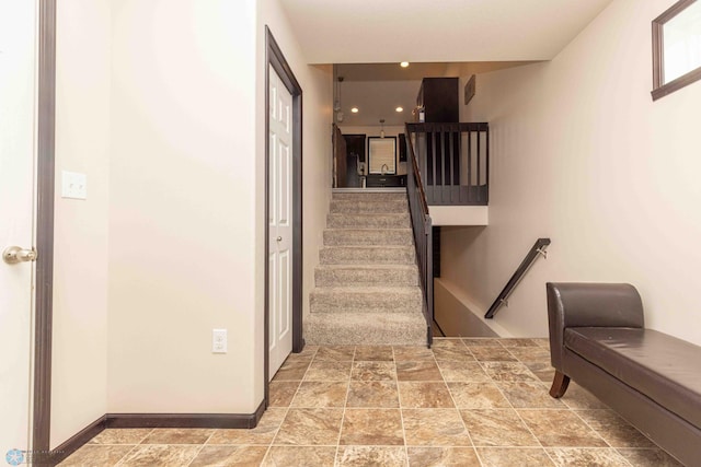 618 23rd Ave W, West Fargo, ND 58078 - stairway featuring baseboards and recessed lighting