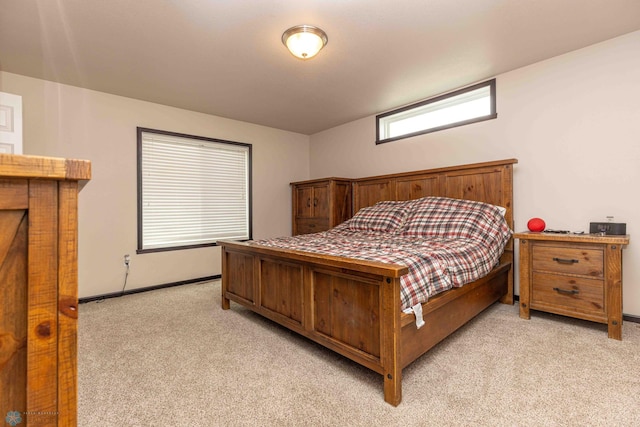 618 23rd Ave W, West Fargo, ND 58078 - bedroom featuring light colored carpet and baseboards