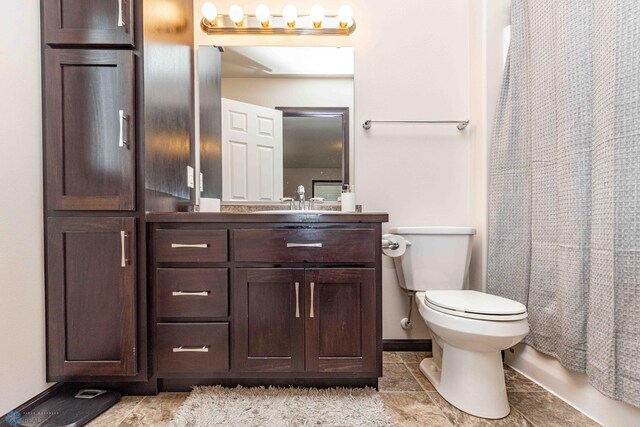 618 23rd Ave W, West Fargo, ND 58078 - full bath featuring vanity, tile patterned flooring, and a shower with curtain
