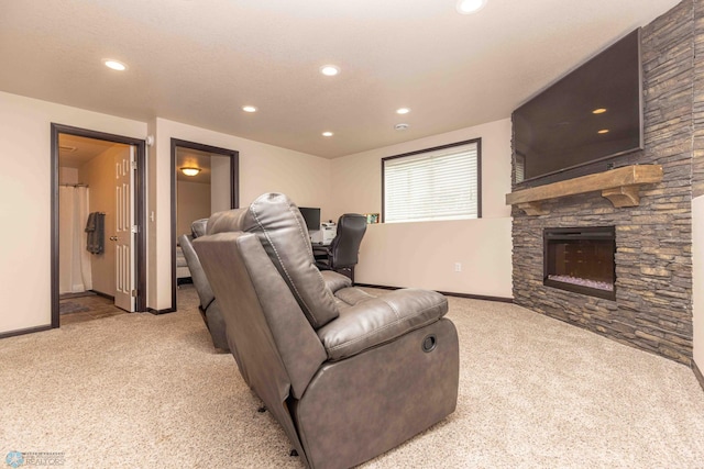 618 23rd Ave W, West Fargo, ND 58078 - cinema room with carpet flooring, recessed lighting, and a stone fireplace